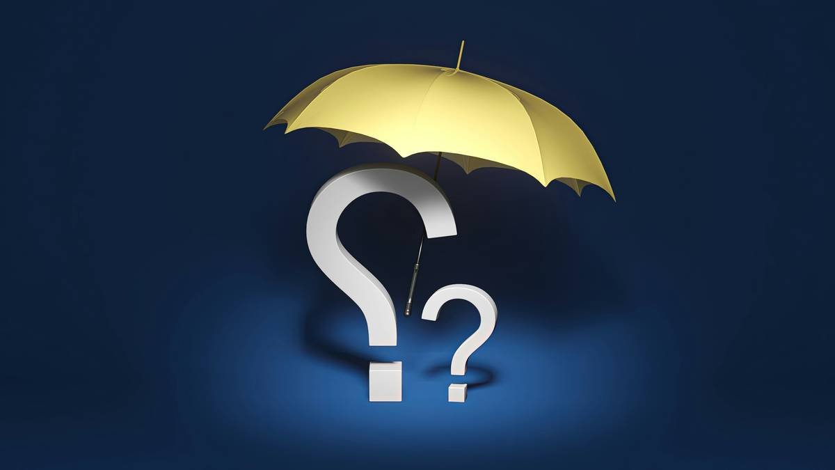 Inventor reviewing patent infringement claim success rate coverage documents with lawyer